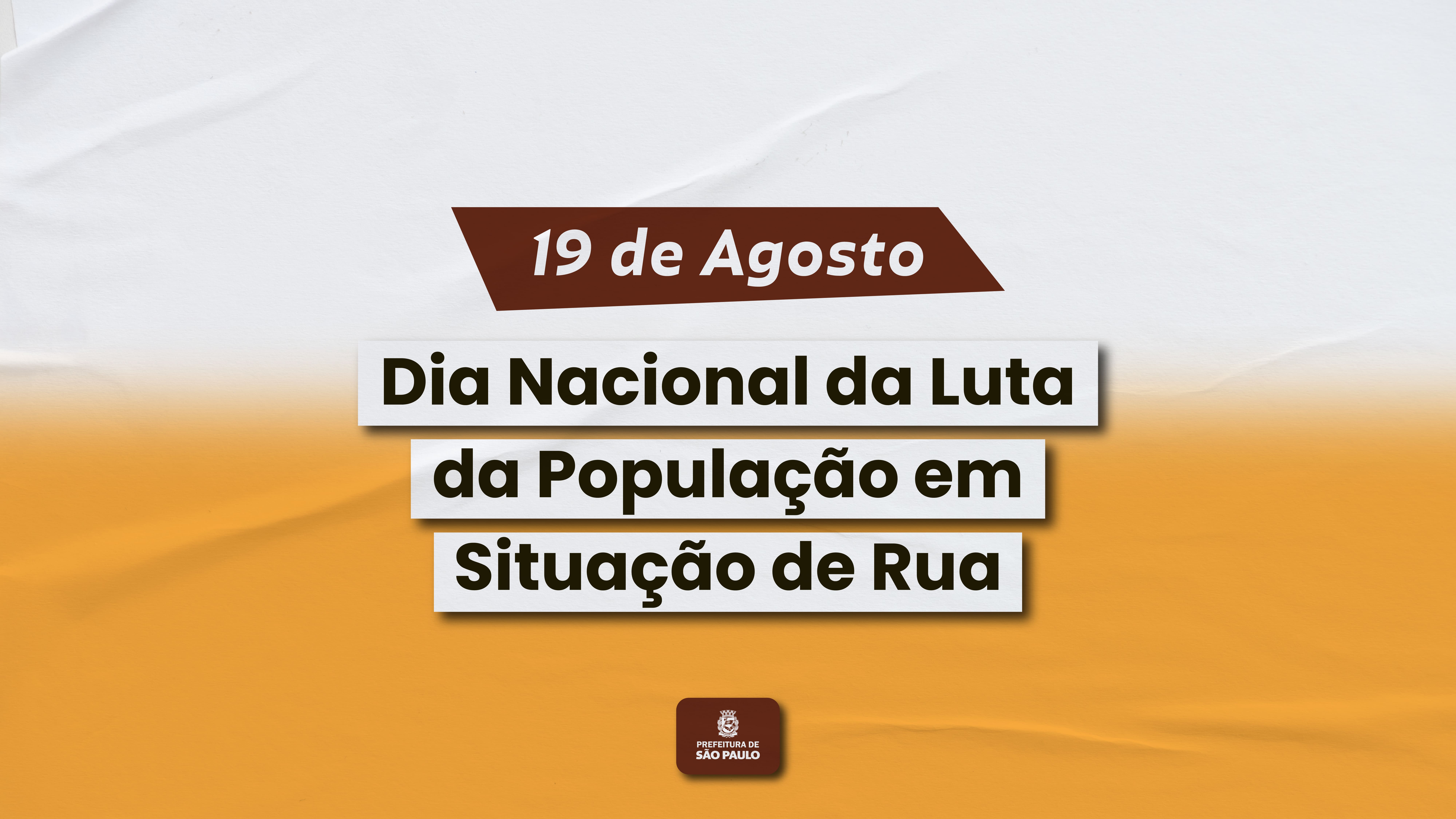 Card institucional com fundo branco e laranja destacando: “19 de Agosto – Dia Nacional da Luta da População em Situação de Rua”.